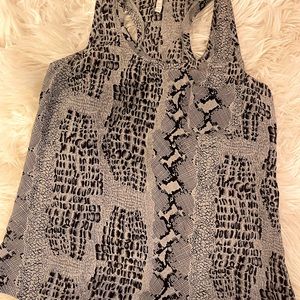 Elegant, timeless and versatile 100% silk Joie sleeveless blouse